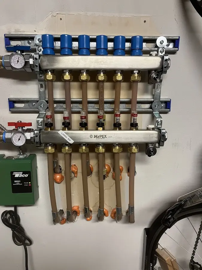 Plumber performing Water Heater Repair at a residential property in Monmouth